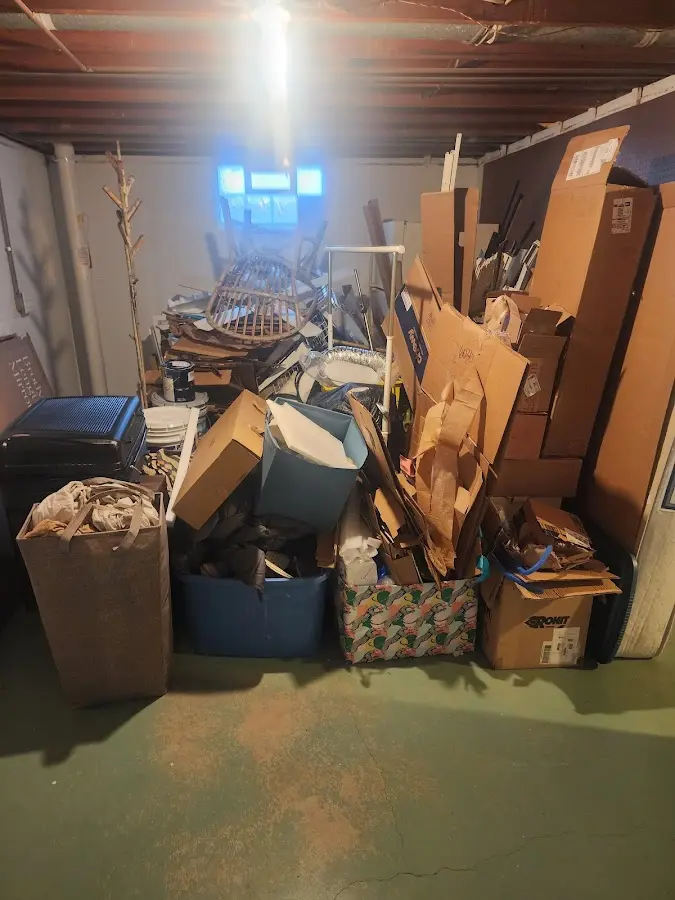 Roll-off dumpster container at job site for Yard Waste Dumpster Rental in Macomb